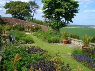 High Buston Hall - middle terrace and the fruit wall